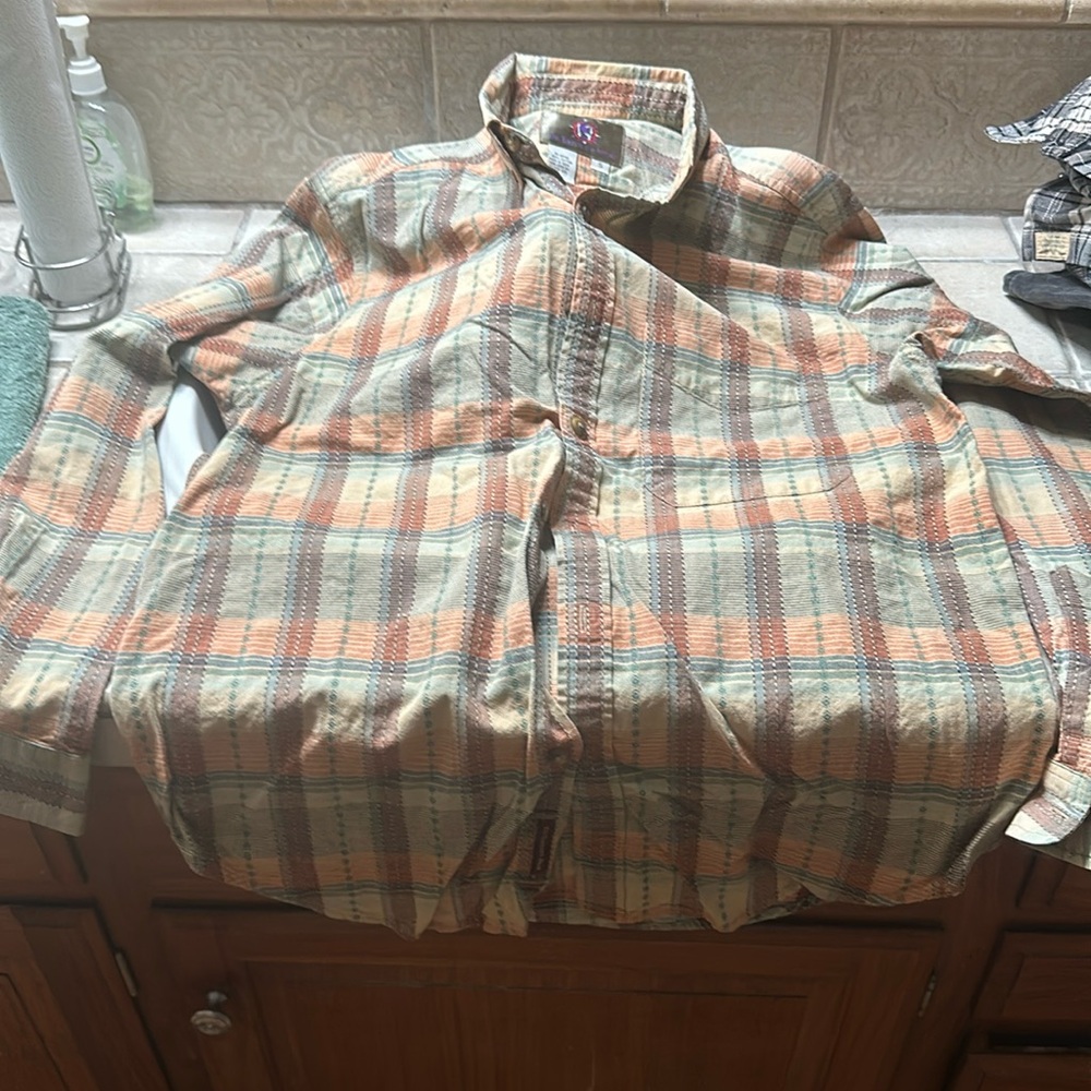 One small plaid shirt